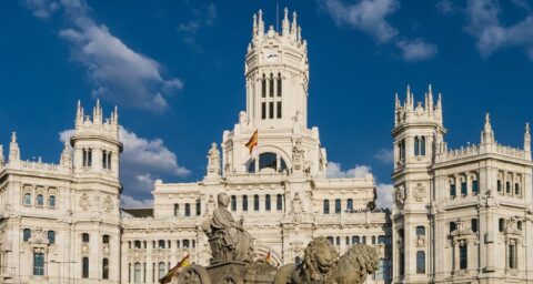 A vibrant collage showcasing the best of Spain, including flamenco dancers, Sagrada Familia, and a beach sunset.